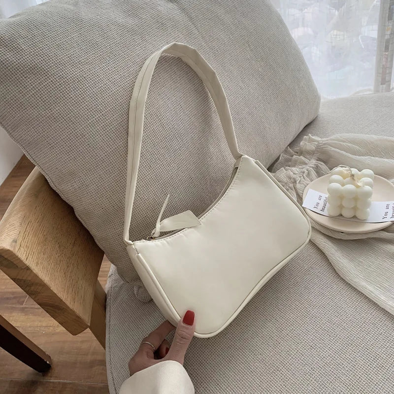 Retro forearm bag women's bow handbag PU leather baguette bag Western style shoulder bag Underarm moisture